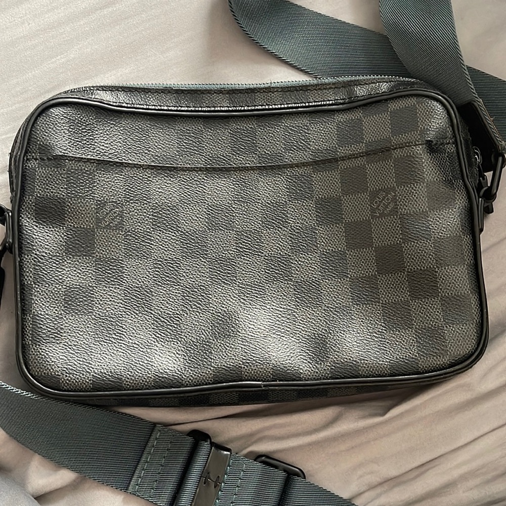 Louis Vuitton messenger bag. Sold